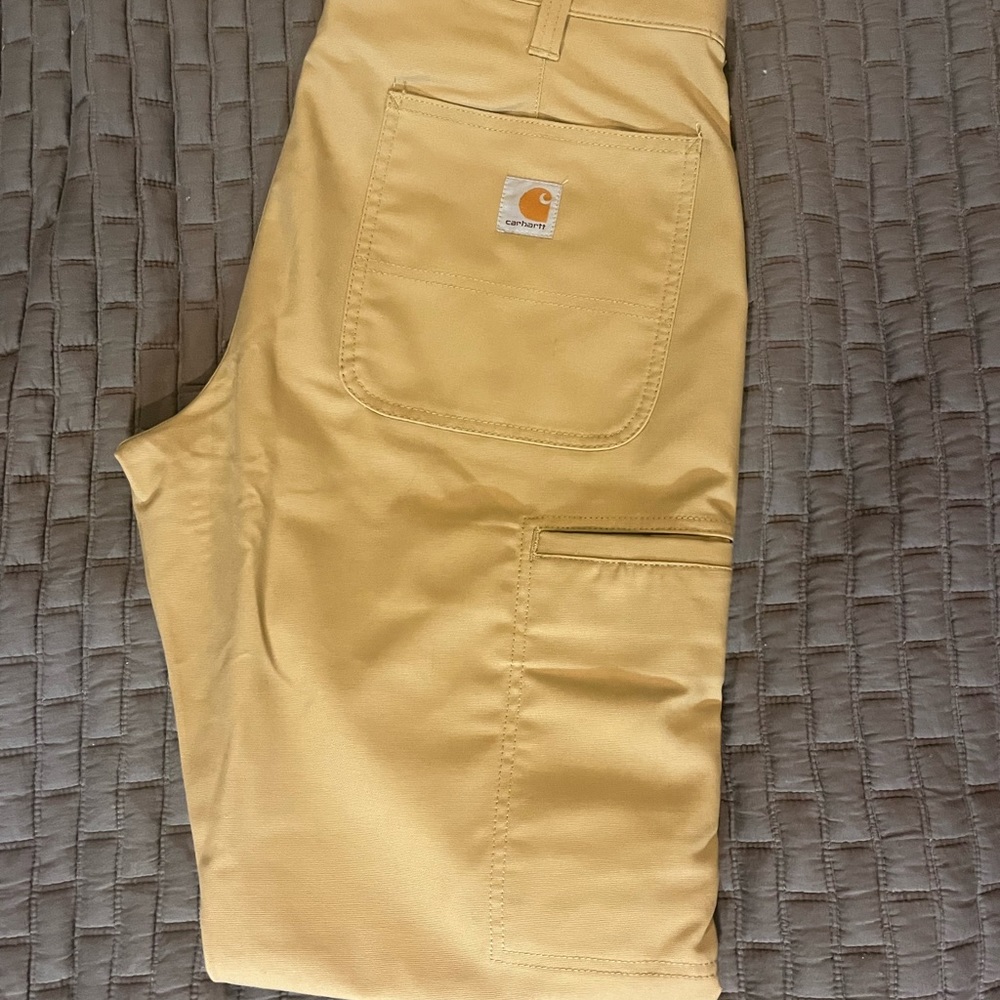 NWT Carhartt relaxed fit kaki work pants.
